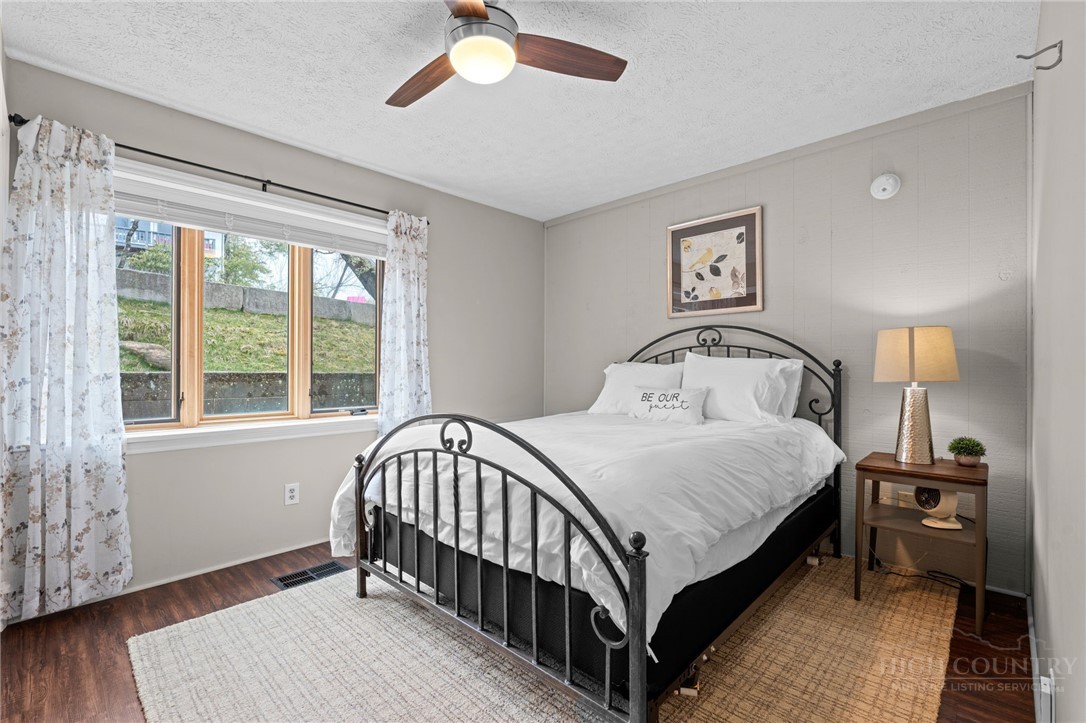 220 Northridge Road, Unit 7 Beech Mountain, NC 28604 - Photo 17 of 22 a bedroom with a bed and a window