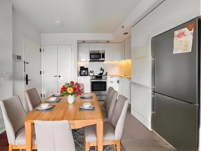 a view of a dining room with furniture