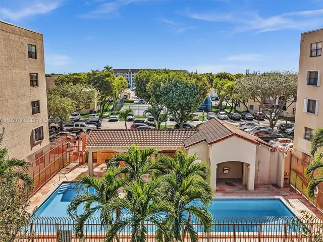 a view of balcony with a potted plant