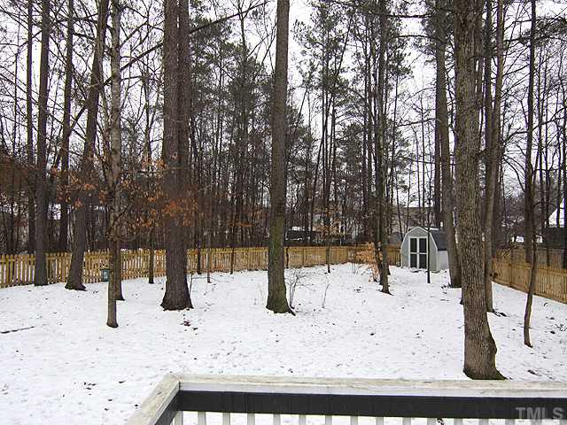 2005 Brightwell Lane Raleigh, NC 27610 - Photo 11 of 12 Spacious Deck Overlooks Private Backyard. Shed conveys. Brand new fence installed!