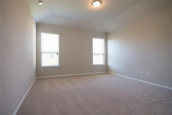 an empty room that has a window