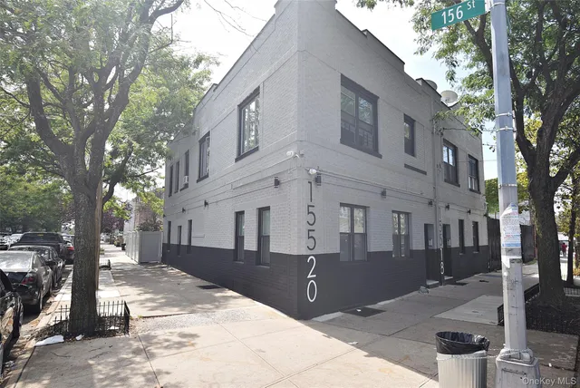 a view of a building with a street