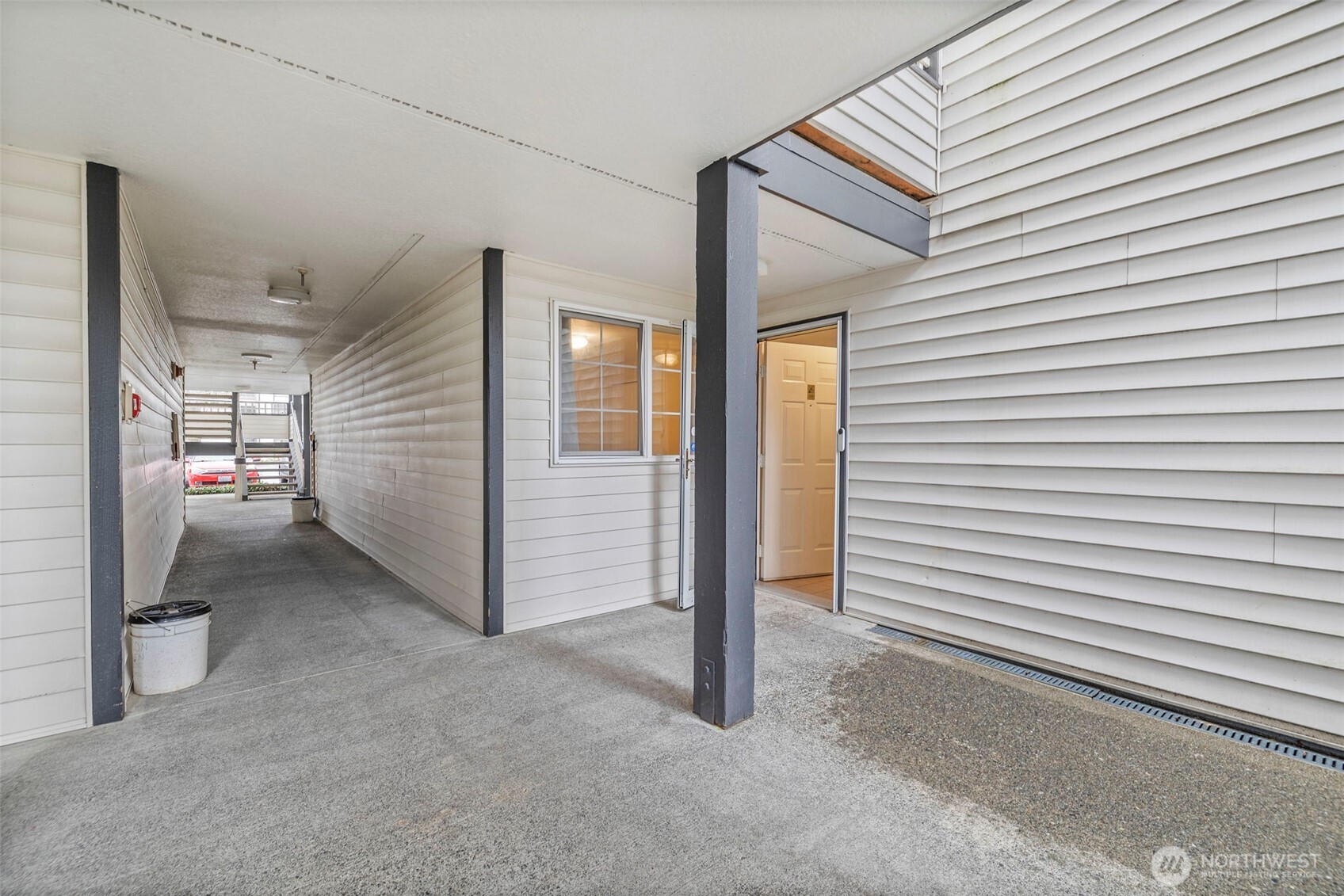 10824 Southeast 170th Street, Unit B103 Renton, WA 98055 - Photo 27 of 31 a view of a room with an empty space