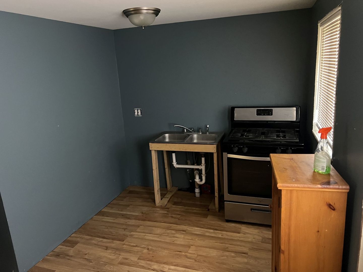 405 West Bissell Street Bloomington, IL 61701 - Photo 8 of 21 a room with furniture and wooden floor