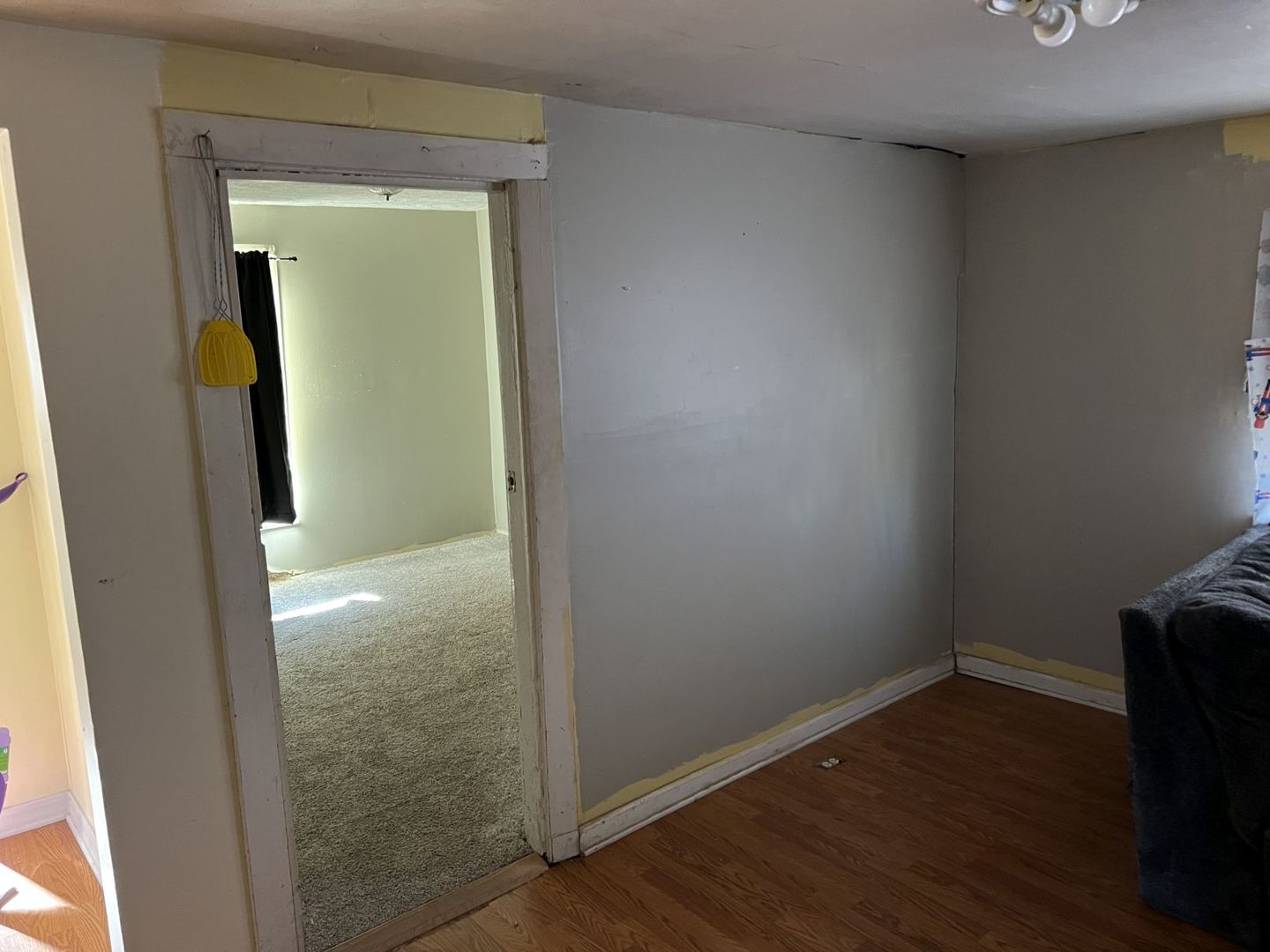 405 West Bissell Street Bloomington, IL 61701 - Photo 9 of 21 an empty room with wooden floor and a table