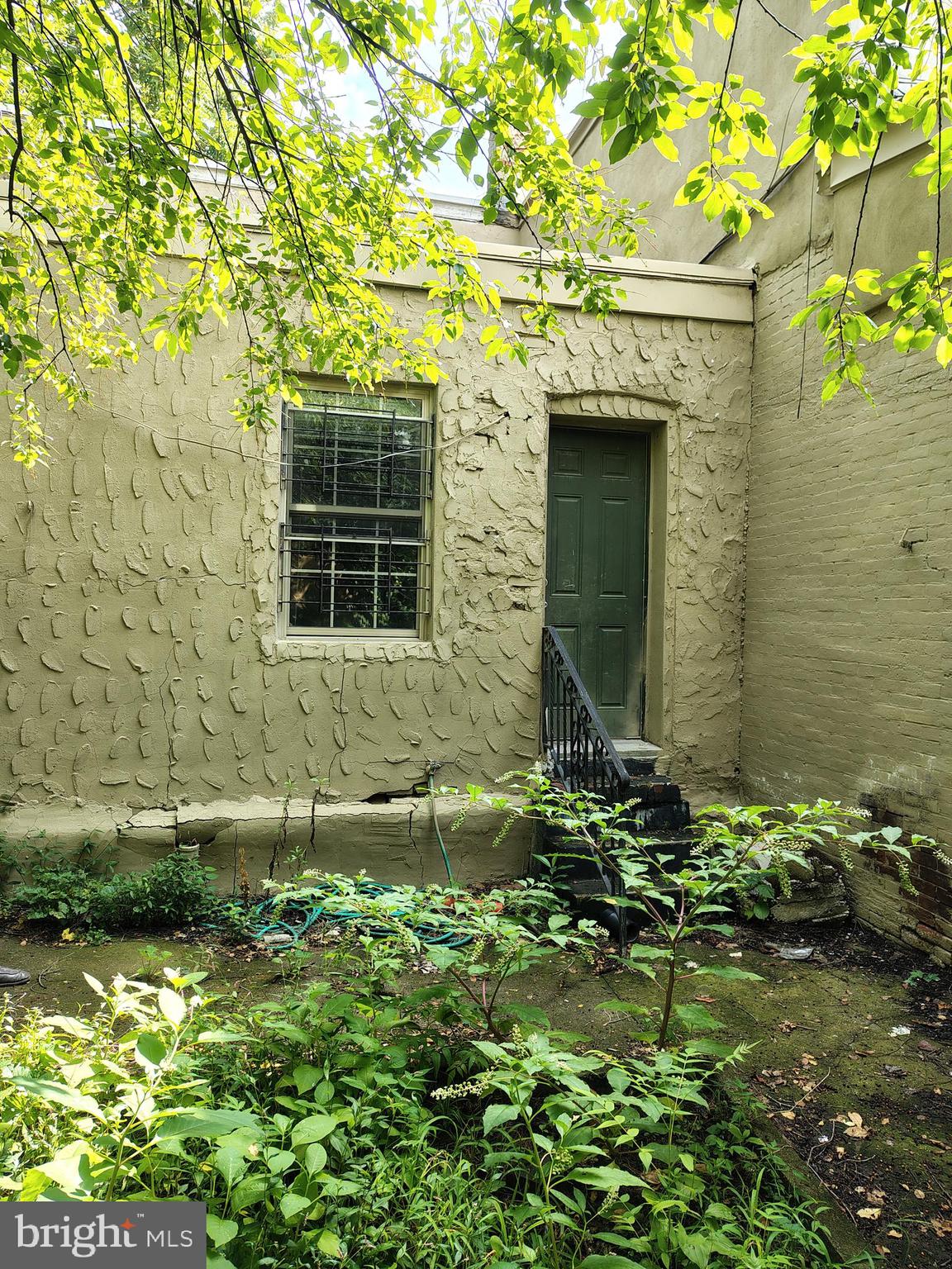 230 North 53rd Street Philadelphia, PA 19139 - Photo 6 of 39 a front view of a house with a yard