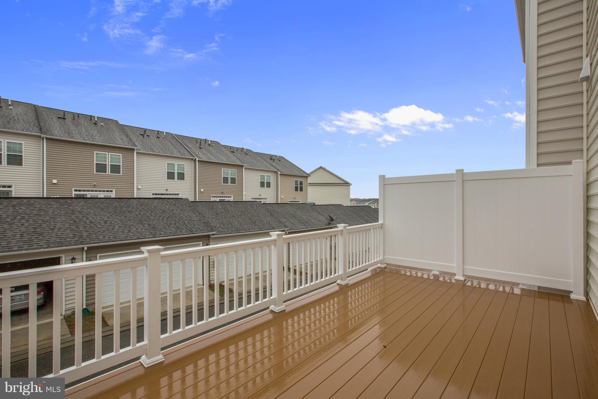 7875 Wormans Mill Road Frederick, MD 21701 - Photo 14 of 30 a view of balcony with wooden floor