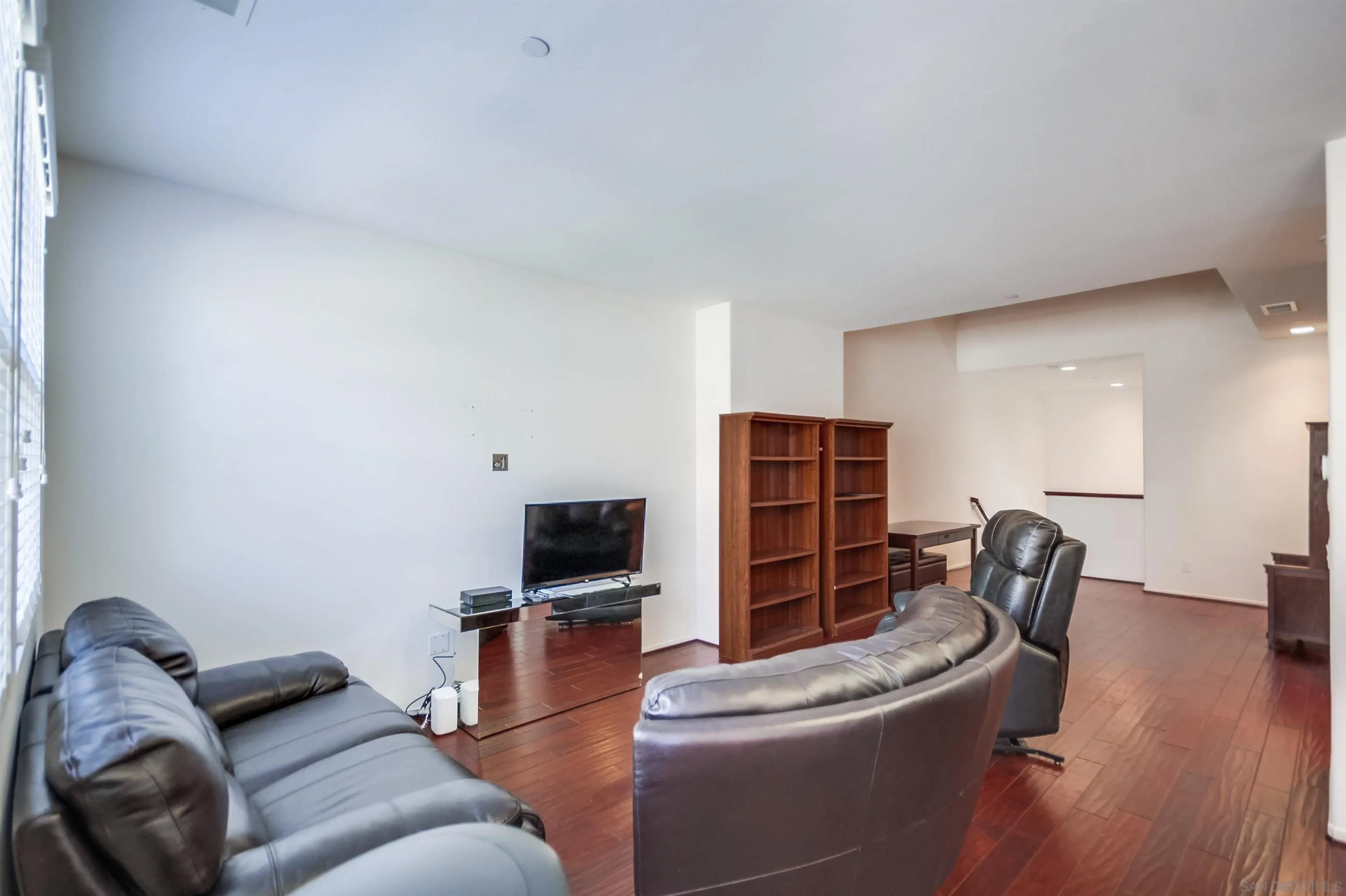 9810 Old Tree Lane Santee, CA 92071 - Photo 12 of 37 a living room with furniture and a flat screen tv