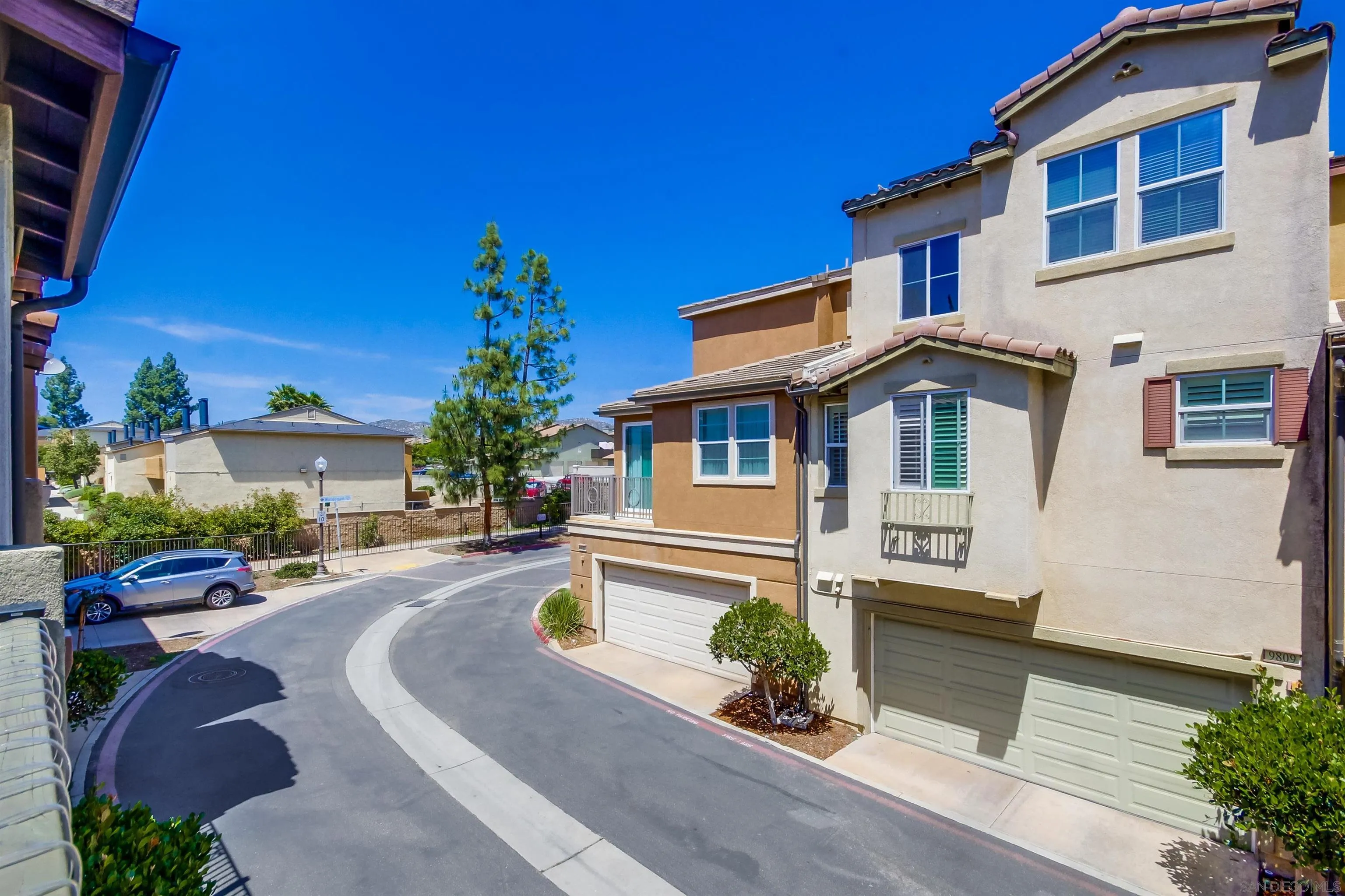 9810 Old Tree Lane Santee, CA 92071 - Photo 19 of 37 a front view of a house with a yard