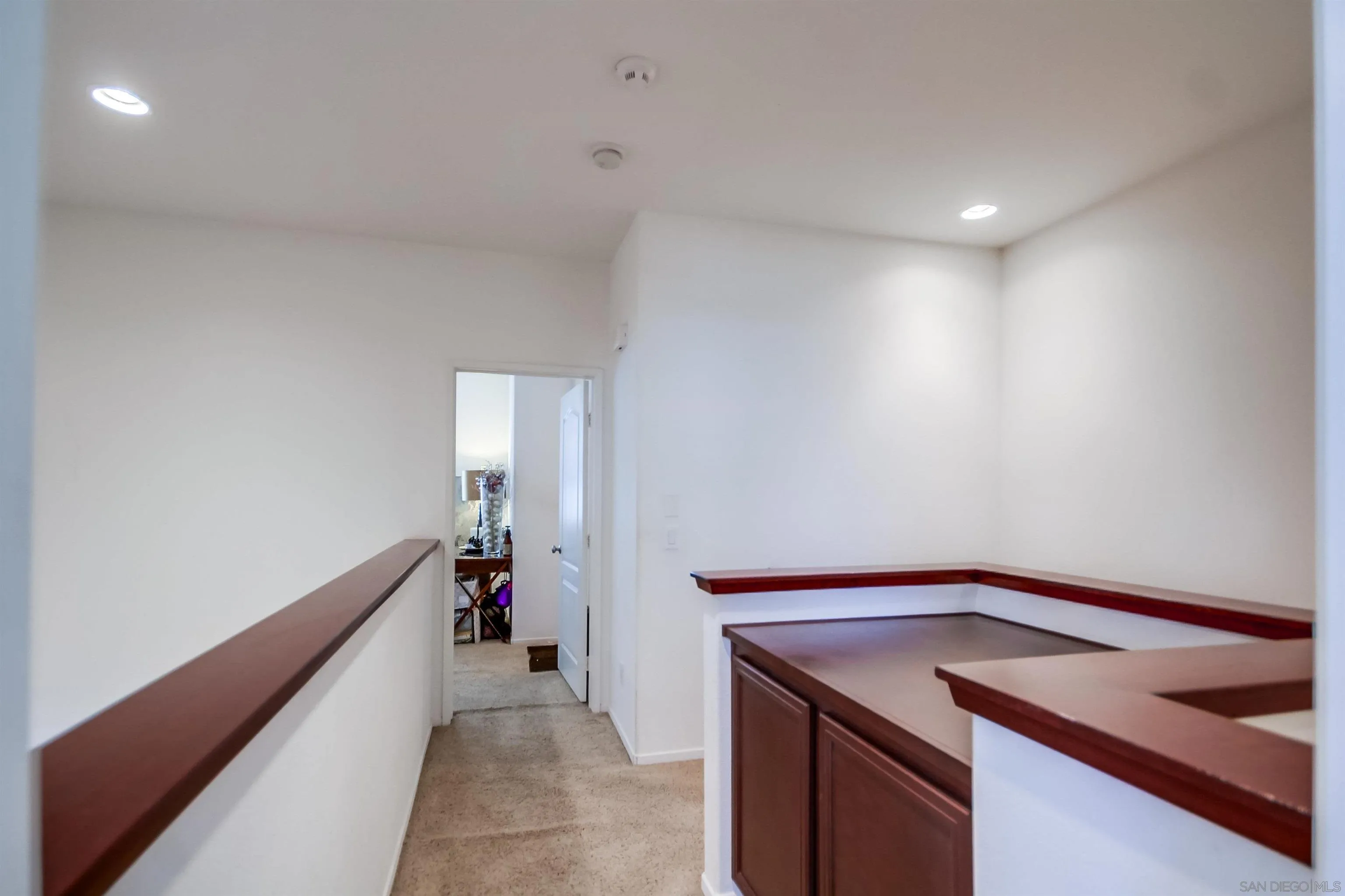 9810 Old Tree Lane Santee, CA 92071 - Photo 27 of 37 a view of a hallway