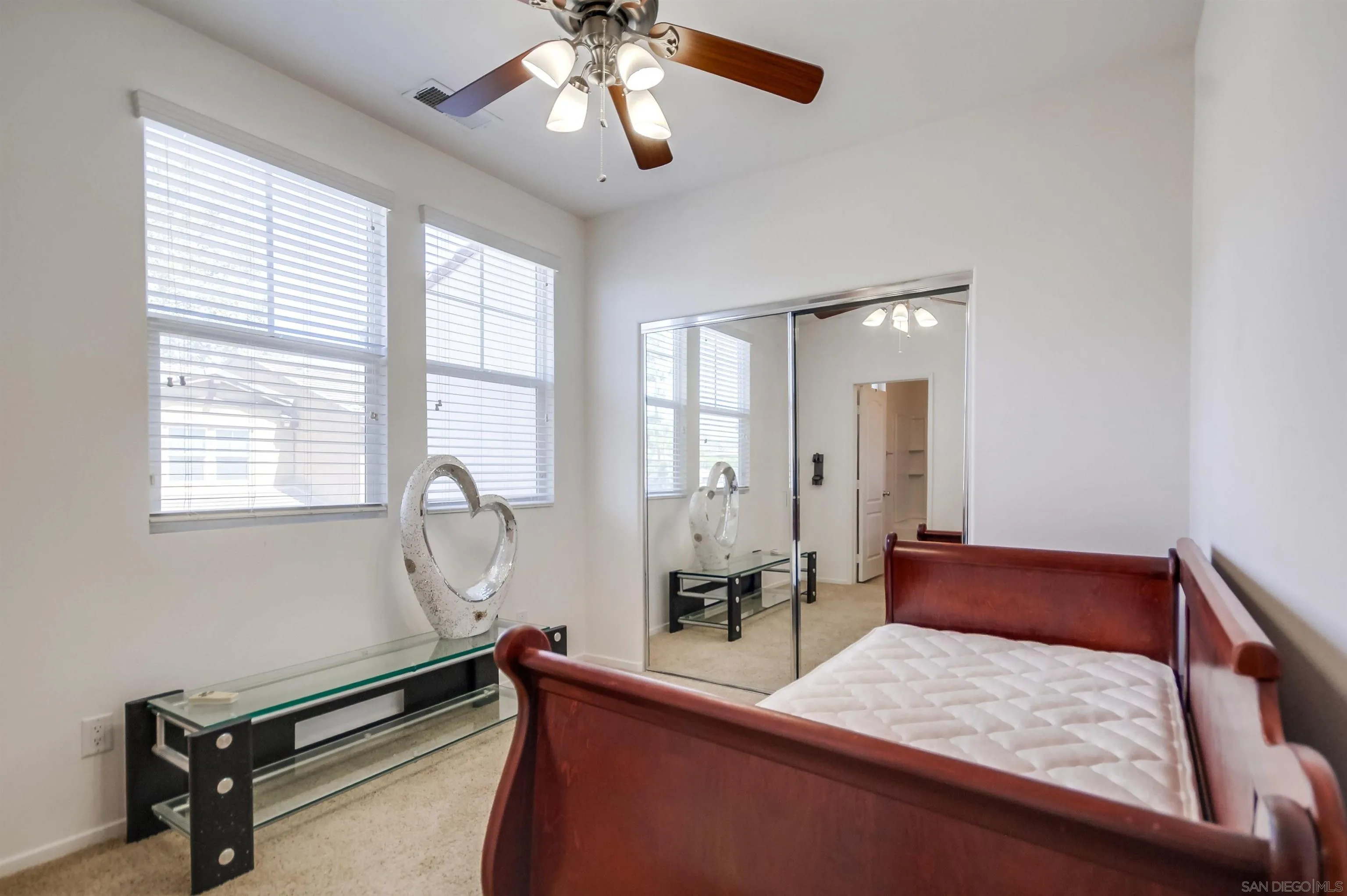 9810 Old Tree Lane Santee, CA 92071 - Photo 29 of 37 a bedroom with furniture and a window