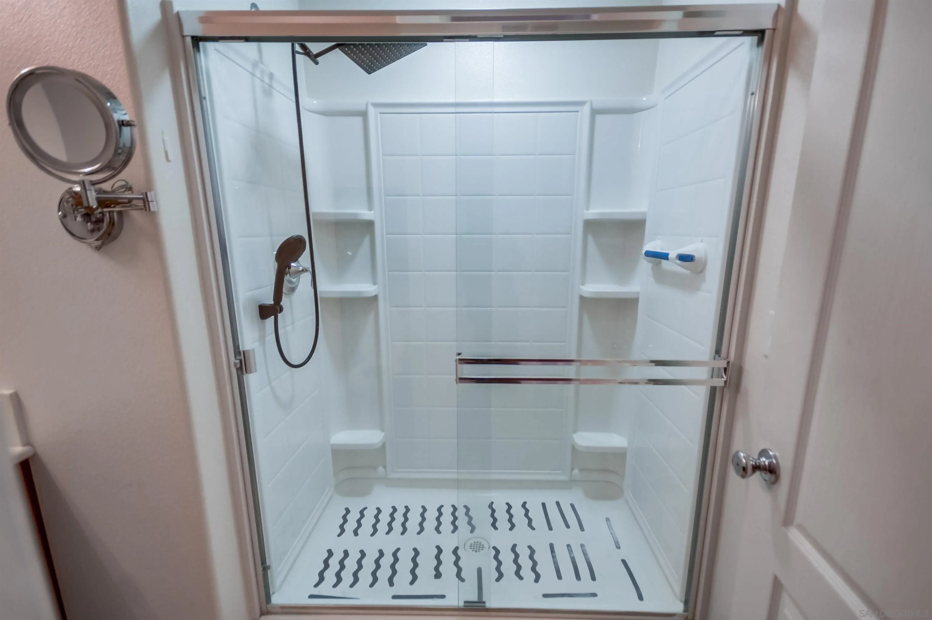 9810 Old Tree Lane Santee, CA 92071 - Photo 34 of 37 a bathroom with a sink a toilet and a mirror