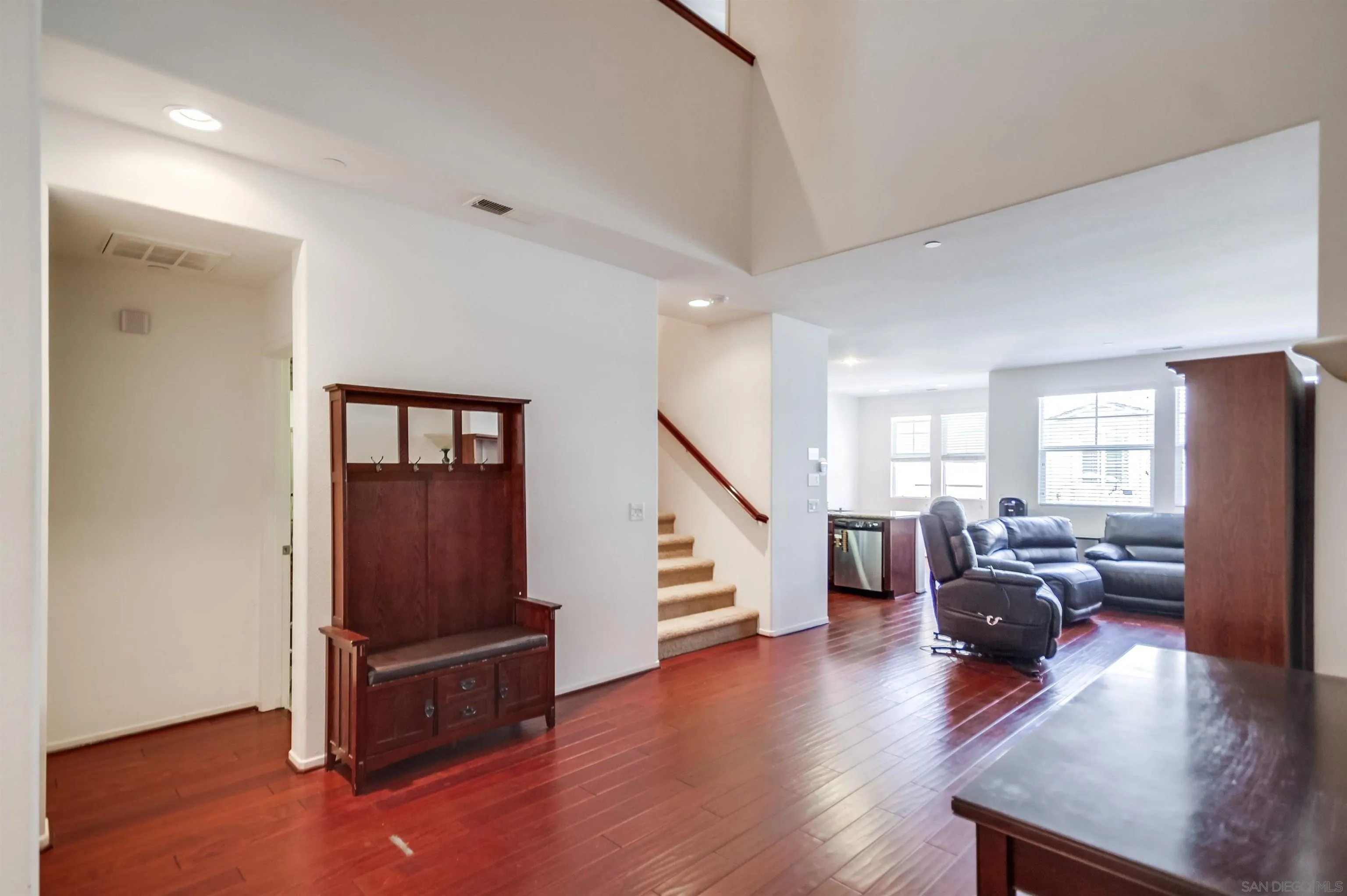 9810 Old Tree Lane Santee, CA 92071 - Photo 5 of 37 a living room with furniture and a wooden floor