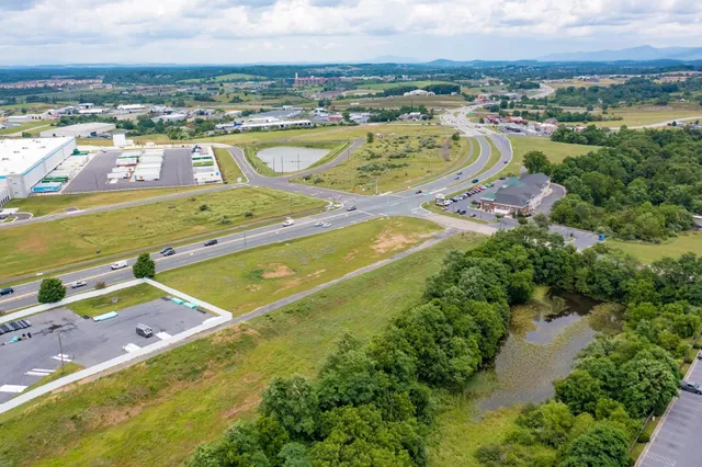 a view of a city with an ocean view