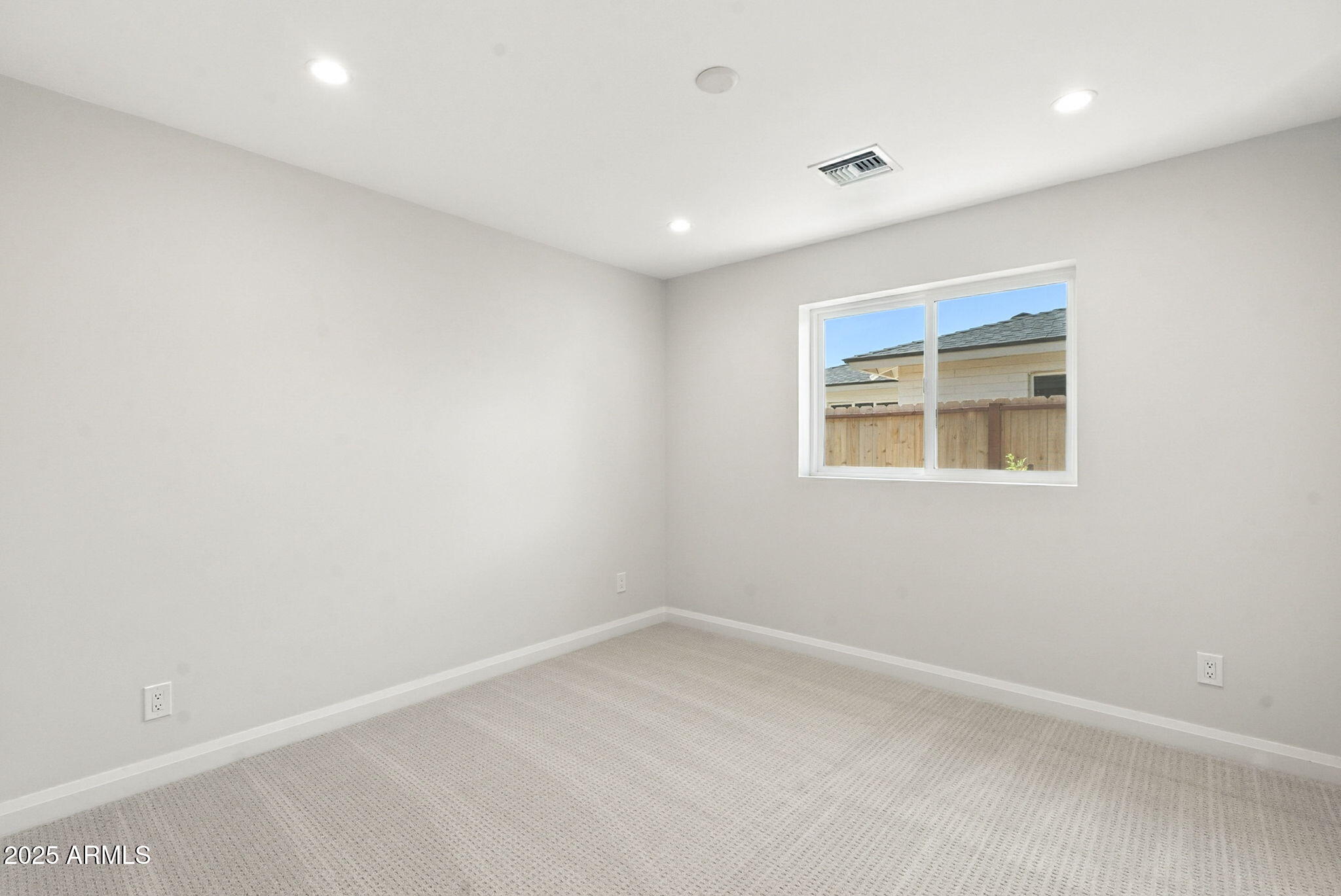 2814 North 51st Street Phoenix, AZ 85008 - Photo 21 of 50 an empty room with a window