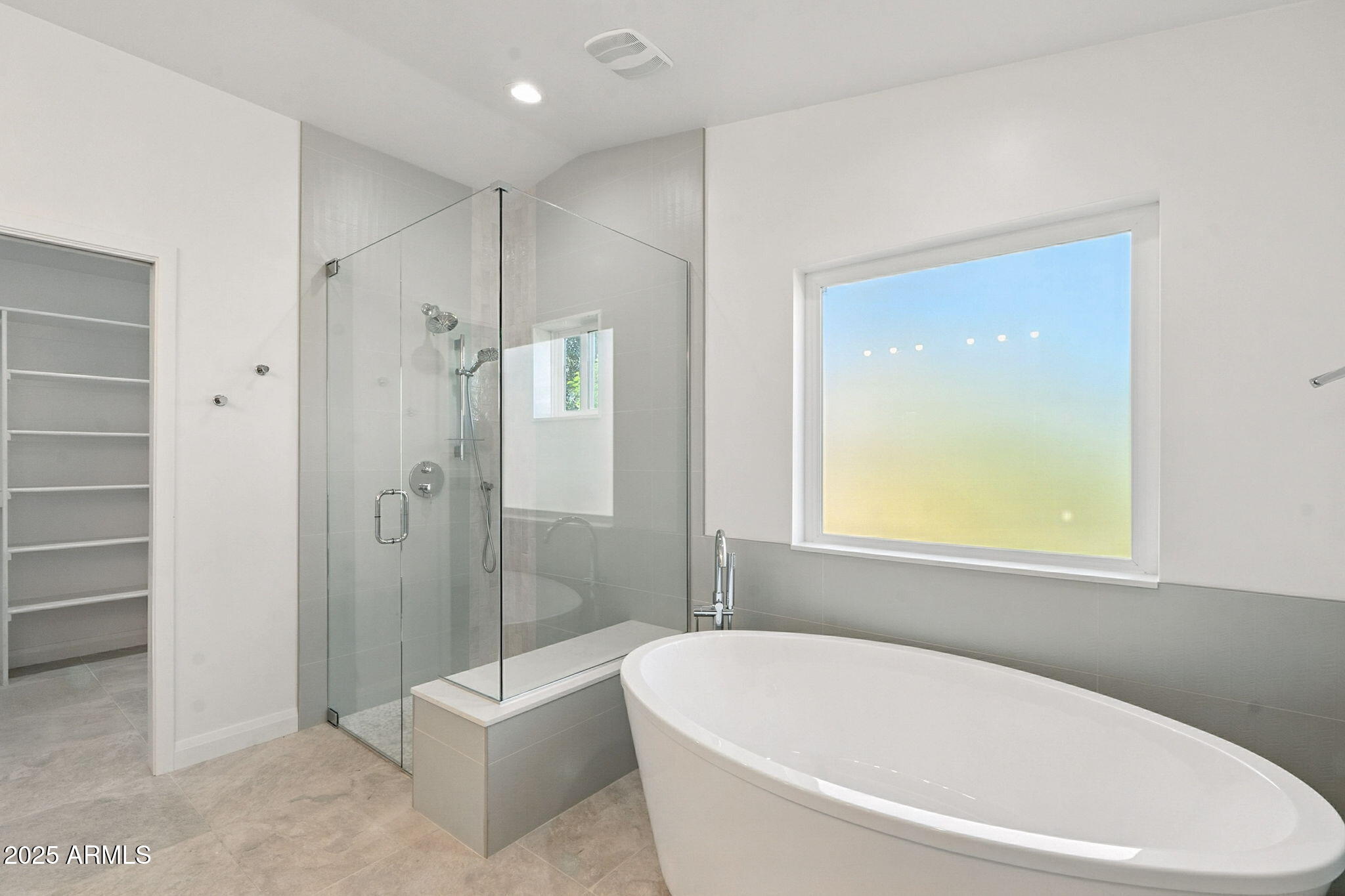 2814 North 51st Street Phoenix, AZ 85008 - Photo 36 of 50 a white bath tub sitting next to a white toilet