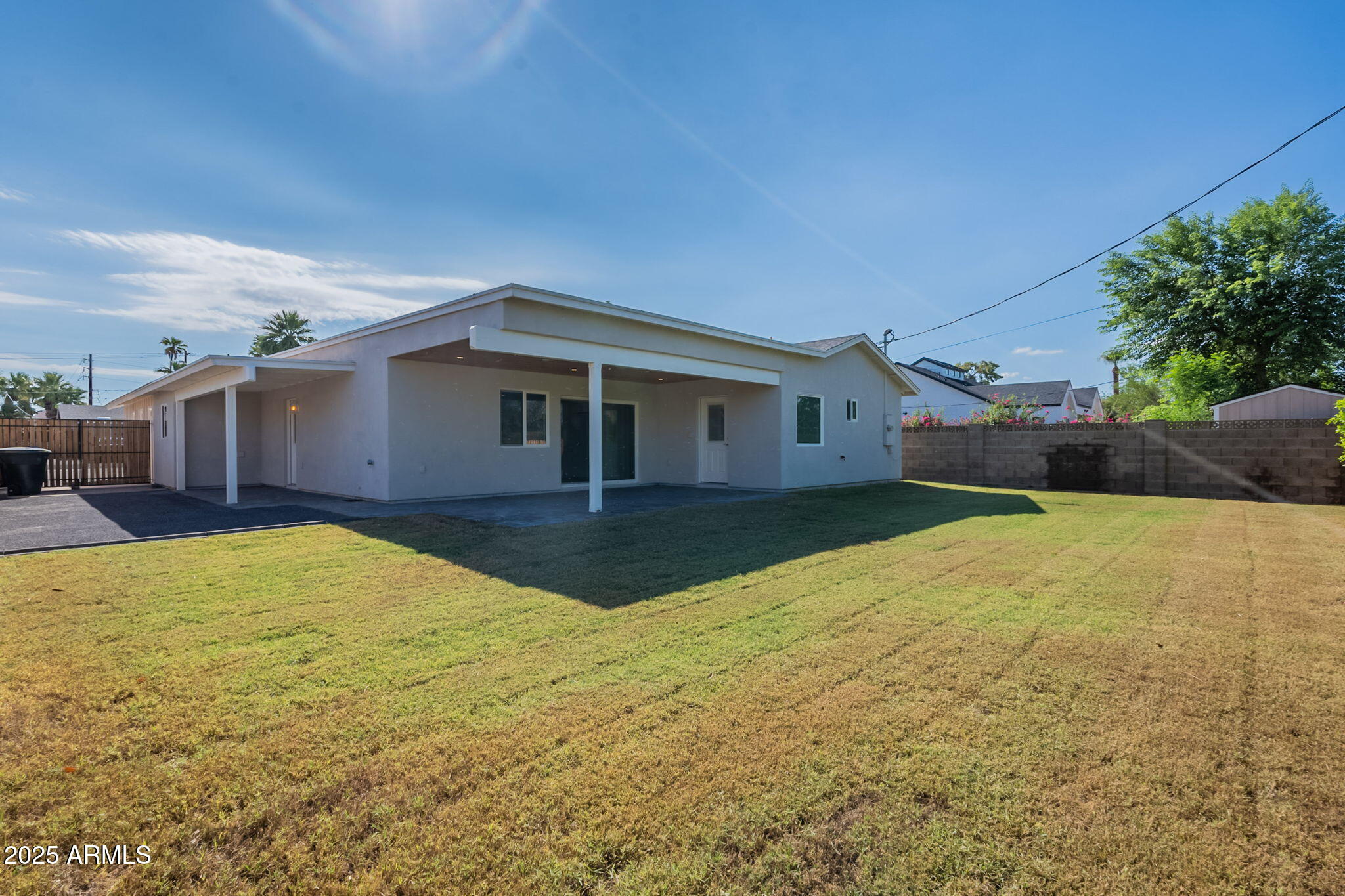 2814 North 51st Street Phoenix, AZ 85008 - Photo 43 of 50 a view of a house with a yard