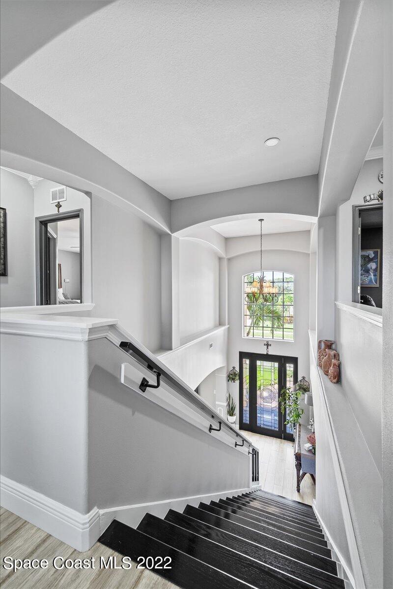 4225 Fenrose Circle Melbourne, FL 32940 - Photo 19 of 49 a view of a living room and dining room
