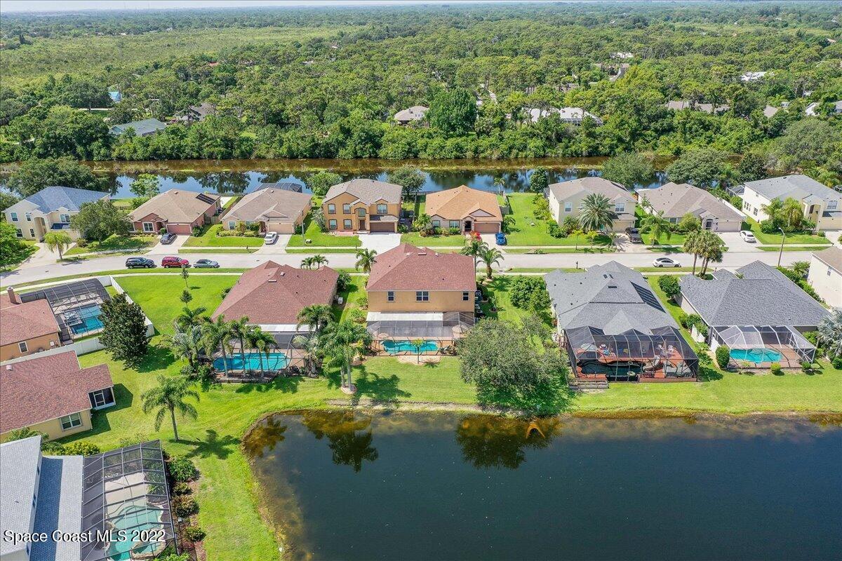 4225 Fenrose Circle Melbourne, FL 32940 - Photo 45 of 49 an aerial view of residential houses with outdoor space and river
