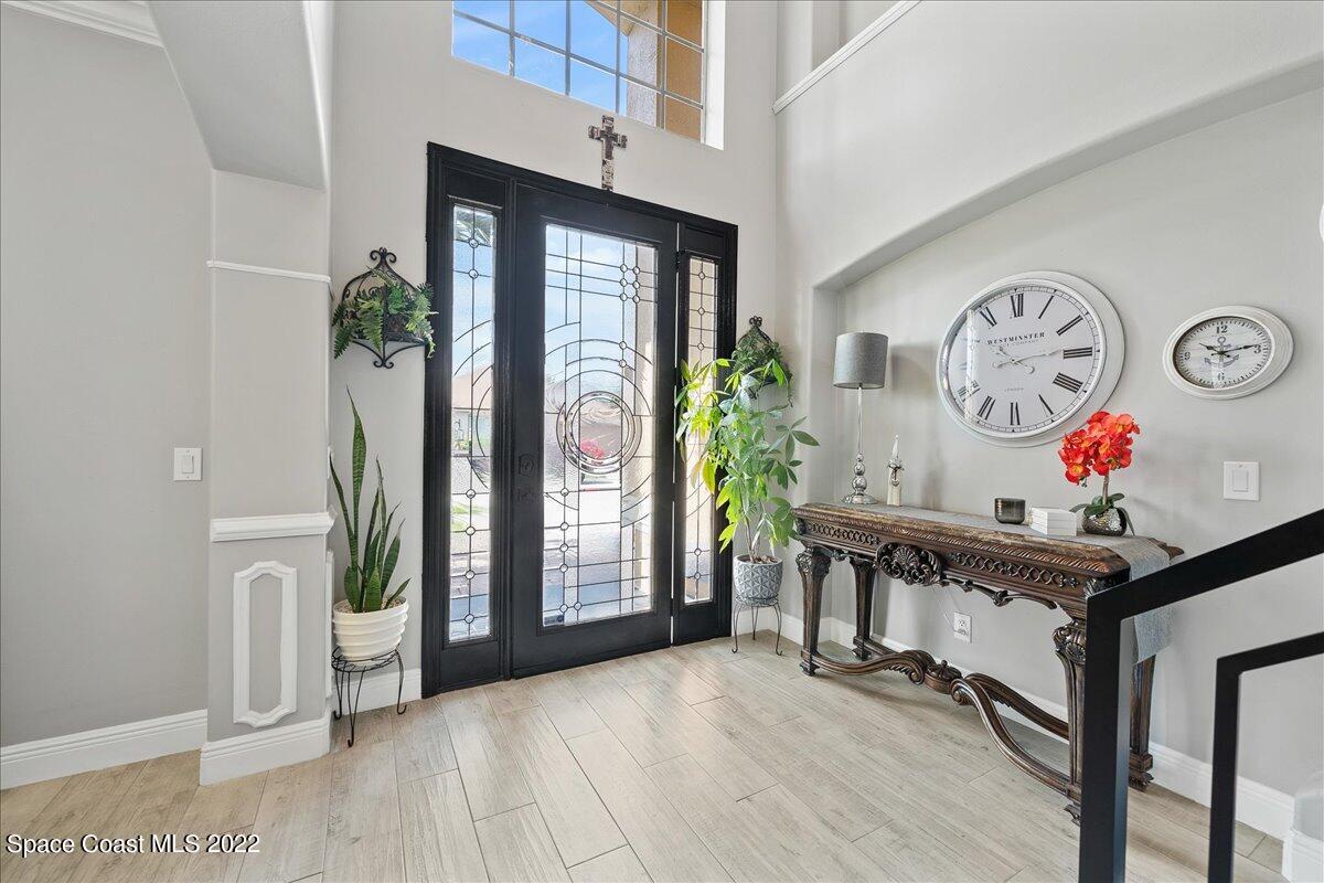 4225 Fenrose Circle Melbourne, FL 32940 - Photo 7 of 49 a view of an entryway with wooden floor