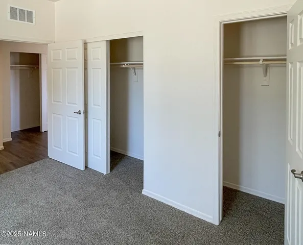 a bathroom with a toilet a sink and a mirror