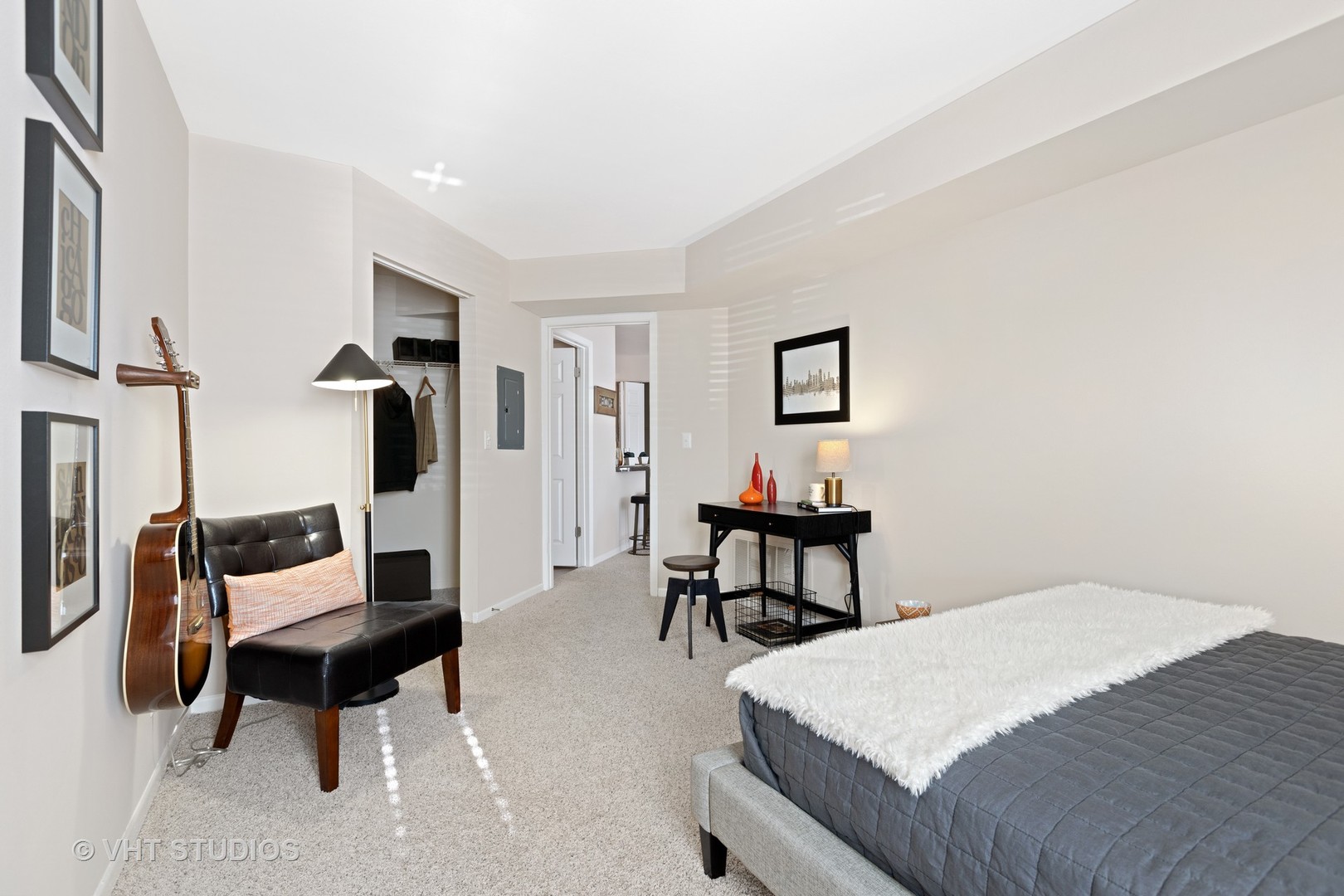 1919 Brookdale Road, Unit 209 Naperville, IL 60563 - Photo 33 of 53 a bedroom with furniture and a bed