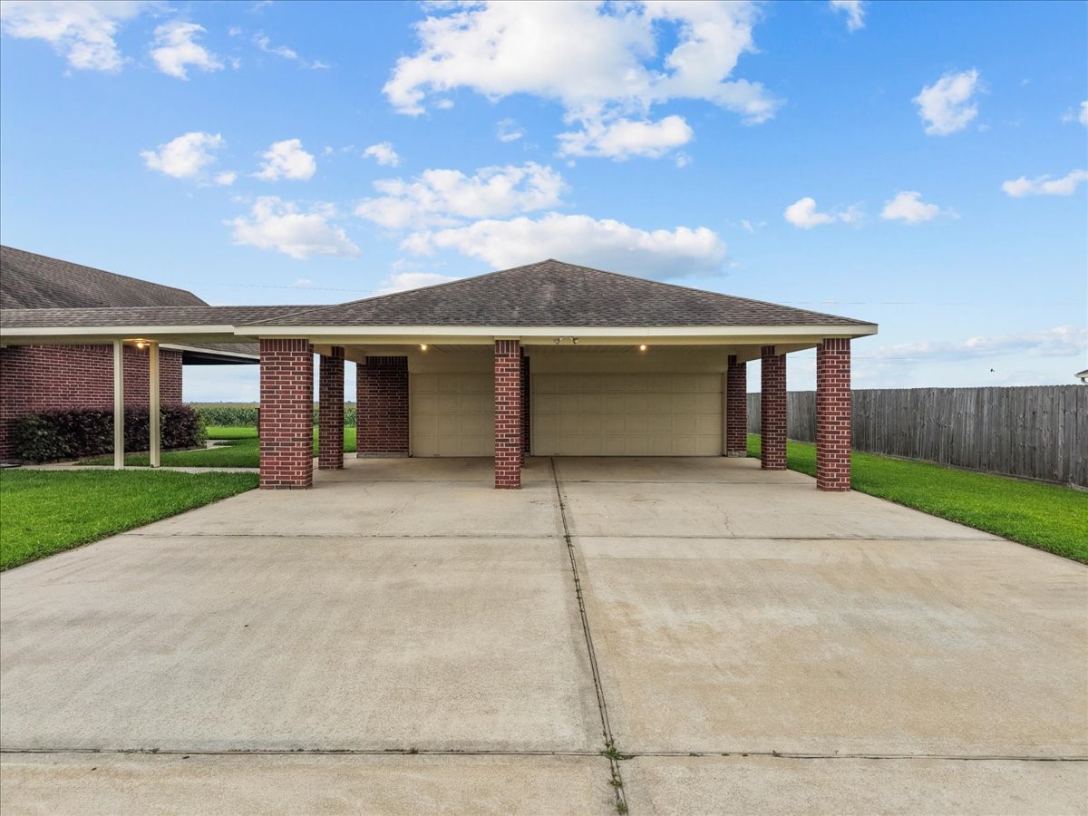 3911 Palm Crest Drive Rosharon, TX 77583 - Photo 4 of 47 4 car+ detached garage with additional cover