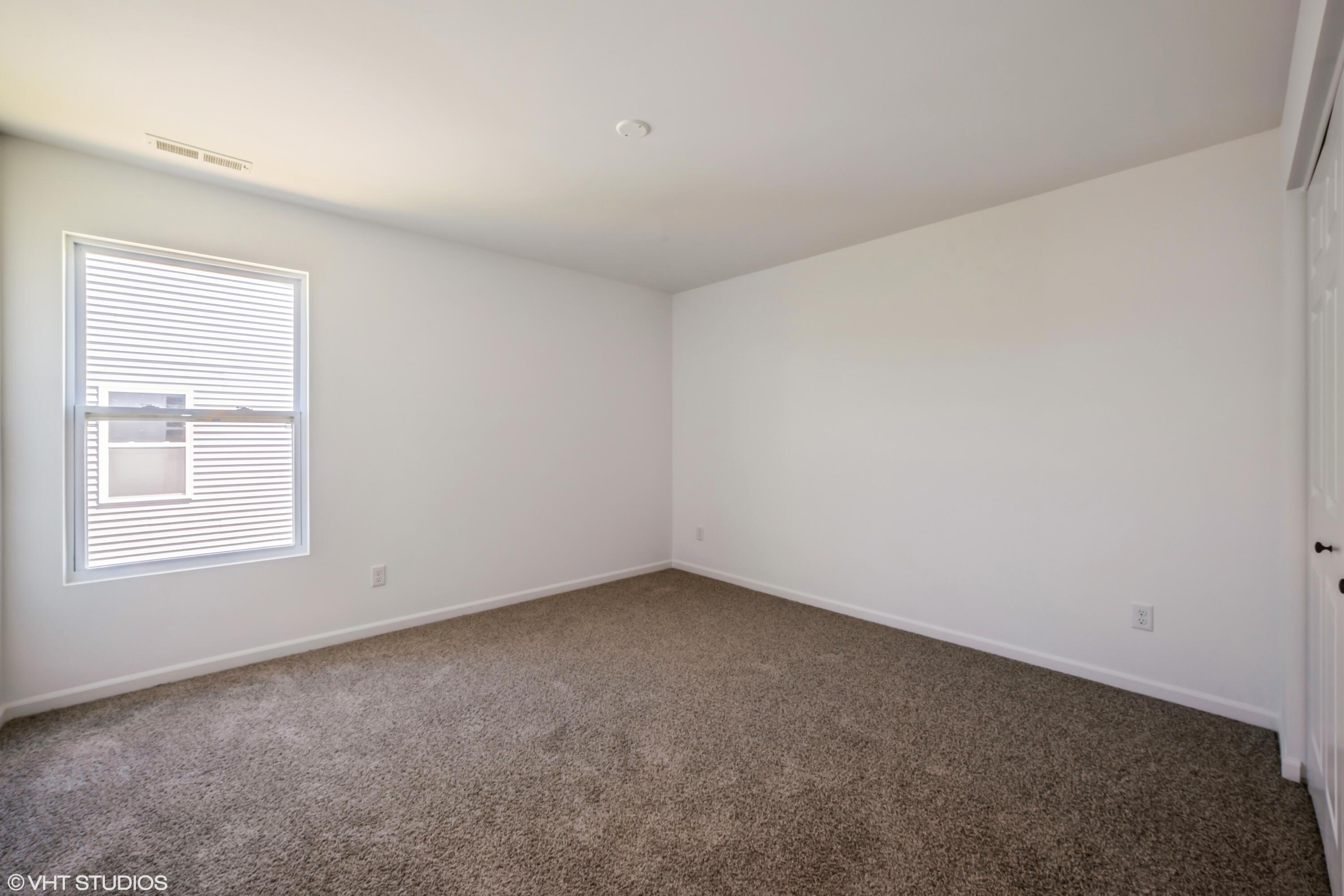 10344 Nevada Place Crown Point, IN 46307 - Photo 11 of 23 an empty room with a window