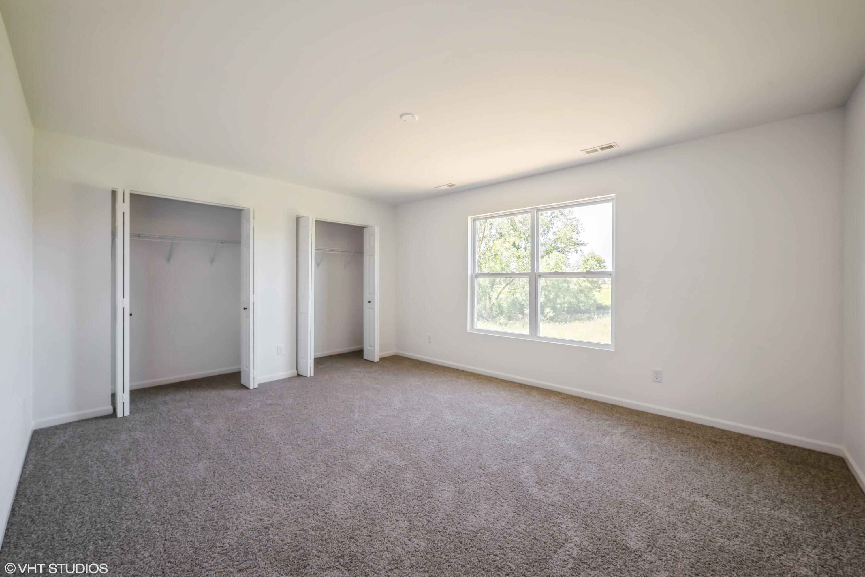 10344 Nevada Place Crown Point, IN 46307 - Photo 13 of 23 an empty room with windows