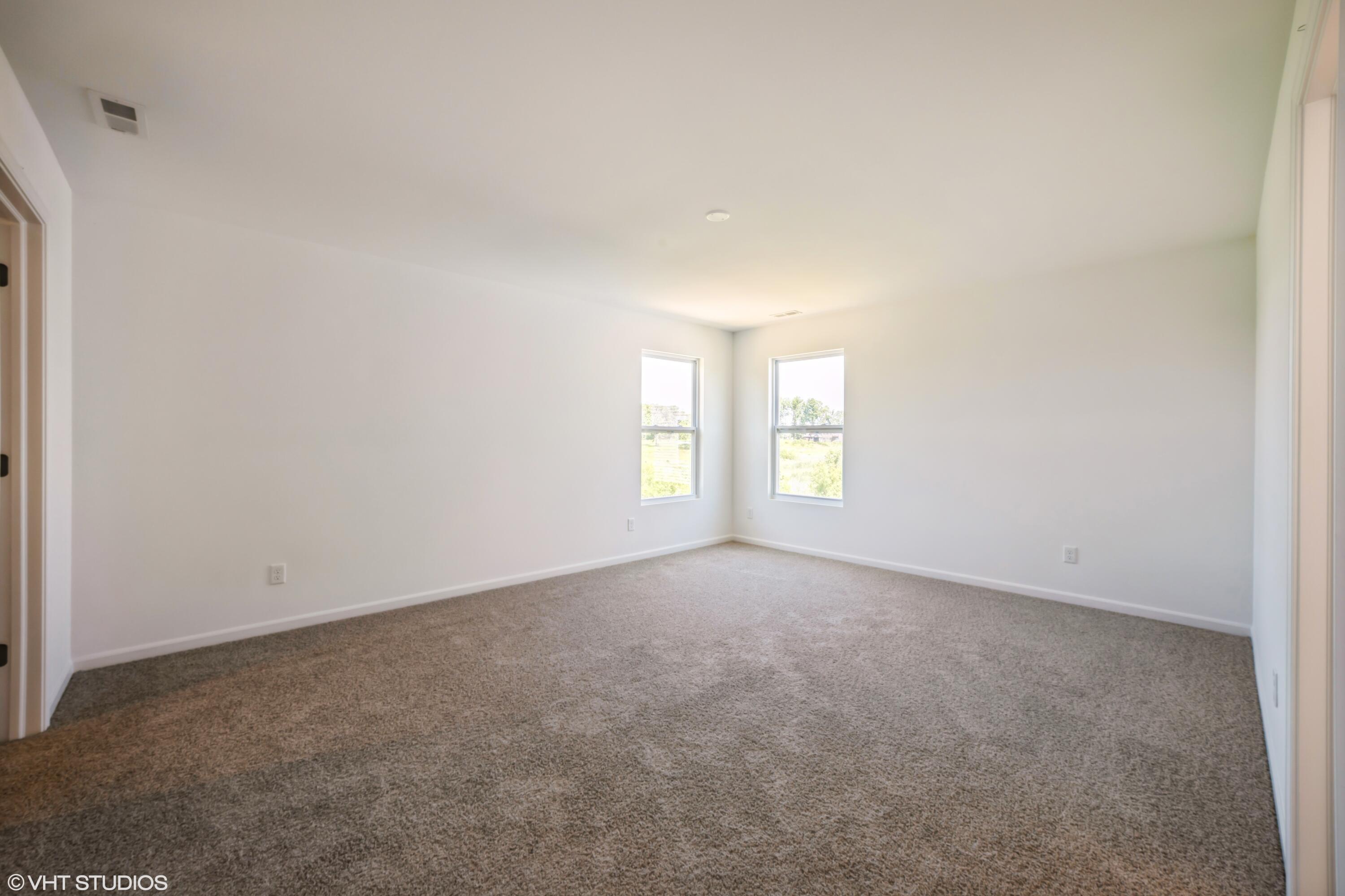 10344 Nevada Place Crown Point, IN 46307 - Photo 18 of 23 an empty room with windows
