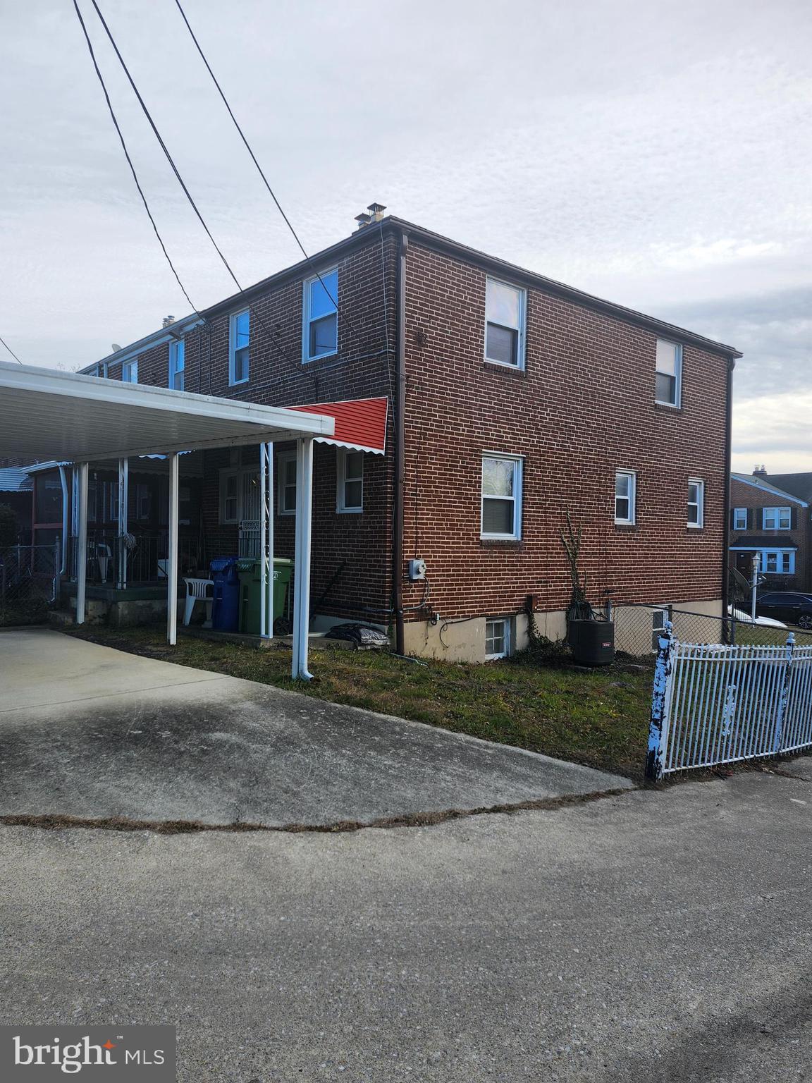 5022 West Hills Road Baltimore, MD 21229 - Photo 3 of 3 a front view of a house with a garden and plants