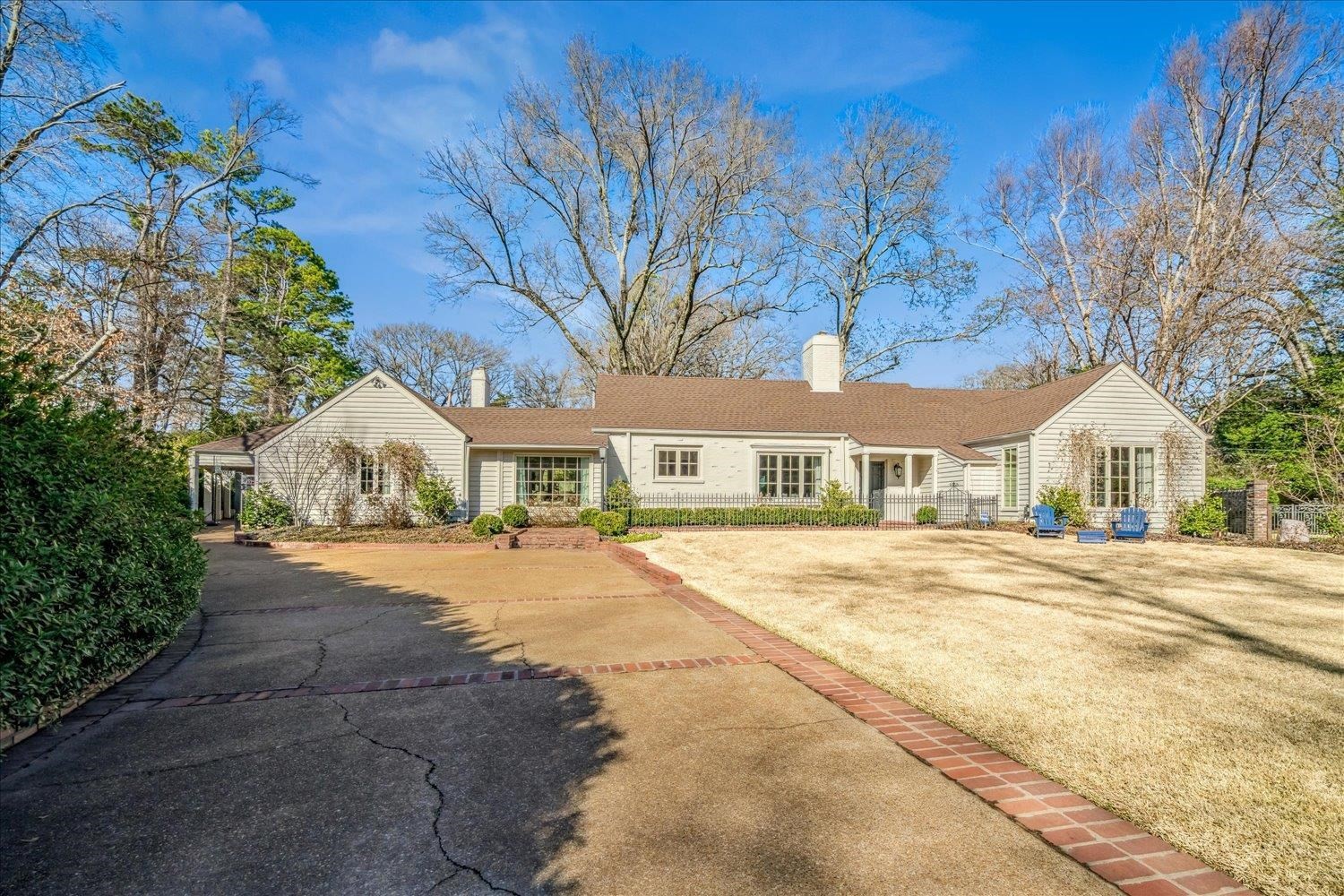 4160 Tuckahoe Road Memphis, TN 38117 - Photo 2 of 39 a front view of a house with a garden
