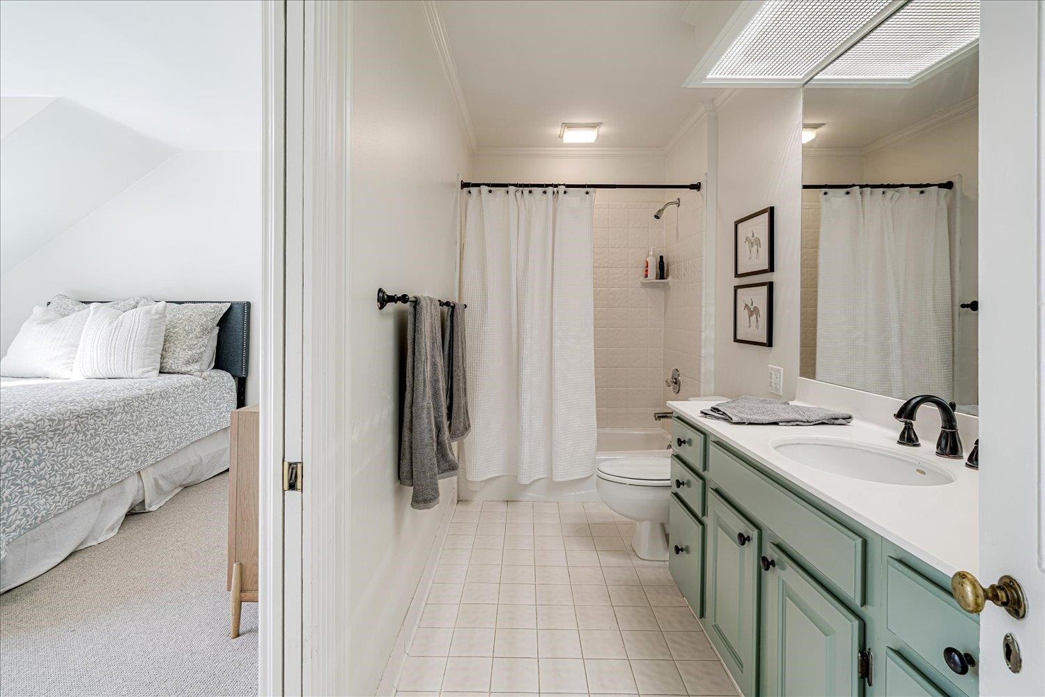 4160 Tuckahoe Road Memphis, TN 38117 - Photo 28 of 39 a bathroom with a double vanity sink and mirror