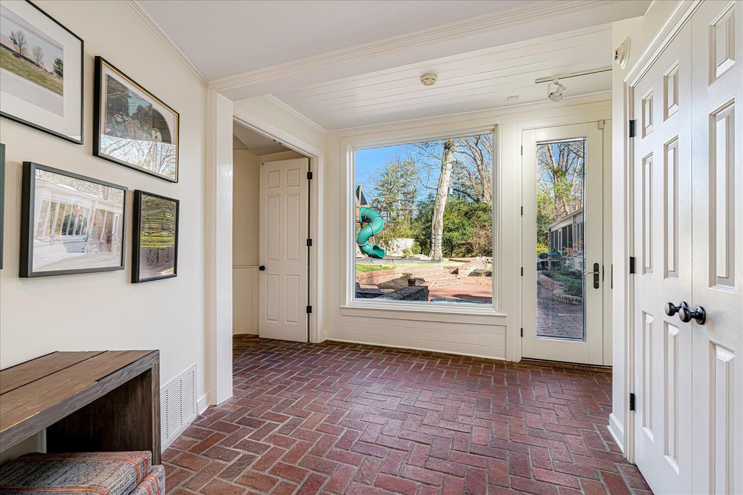 4160 Tuckahoe Road Memphis, TN 38117 - Photo 31 of 39 a view of an entryway with wooden floor and a window