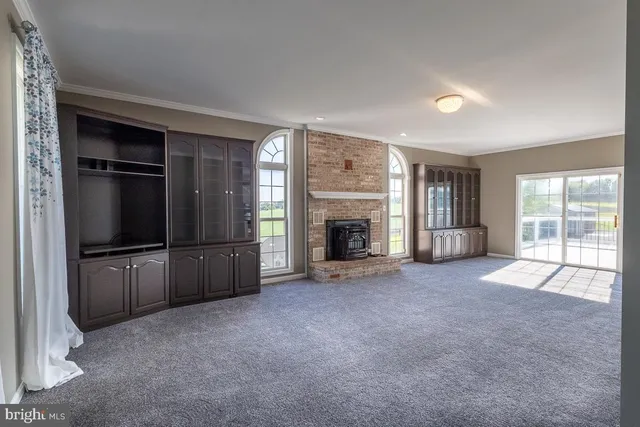 a kitchen with stainless steel appliances granite countertop a stove and a sink