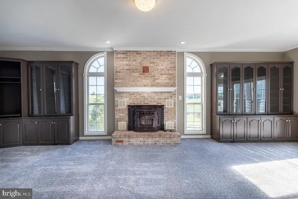 a kitchen with stainless steel appliances a refrigerator sink and stove
