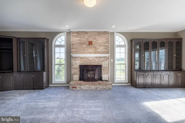 a kitchen with stainless steel appliances a refrigerator sink and stove