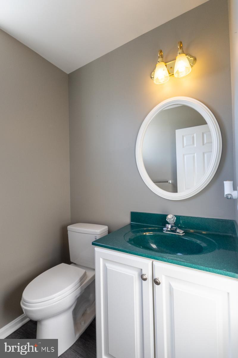9630 Clemsonville Road Union Bridge, MD 21791 - Photo 20 of 70 a bathroom with a toilet and a mirror