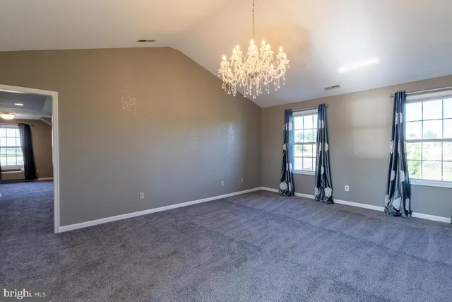 a view of an entryway with a livingroom