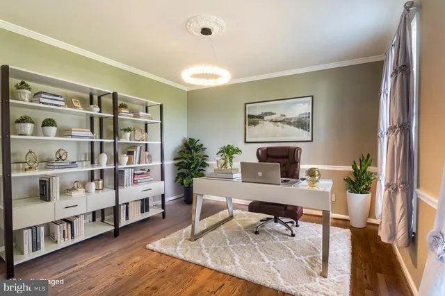 a kitchen with stainless steel appliances granite countertop a refrigerator a stove microwave and cabinets