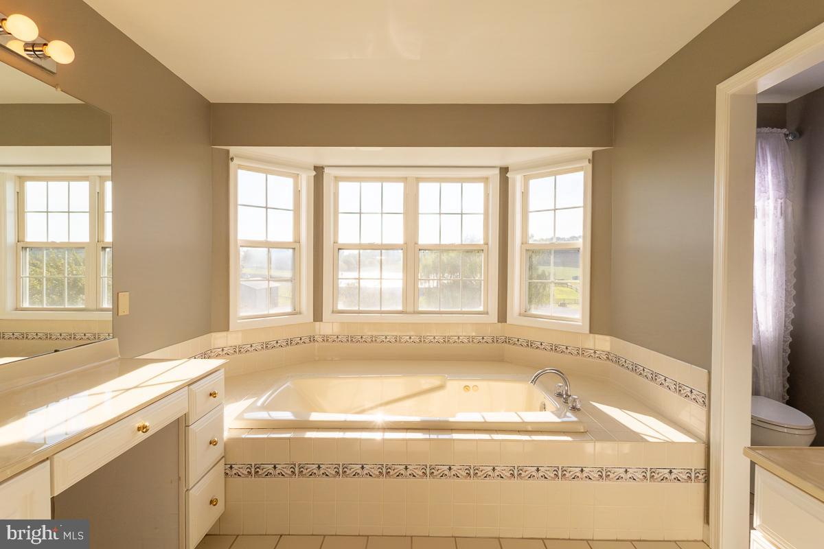 9630 Clemsonville Road Union Bridge, MD 21791 - Photo 31 of 70 a view of an empty room with a window