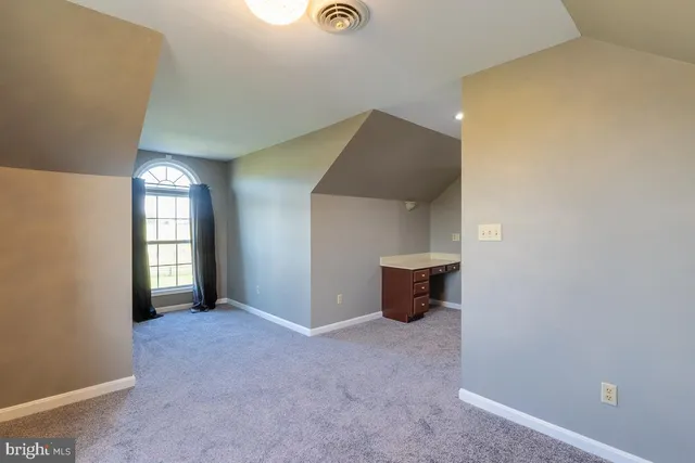 an aerial view of a golf course with a park