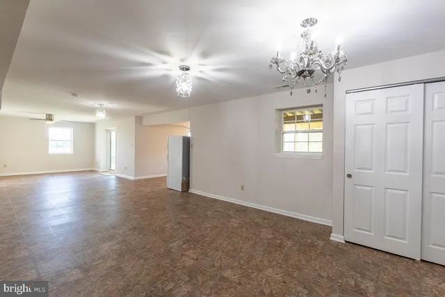 a front view of a house with a backyard