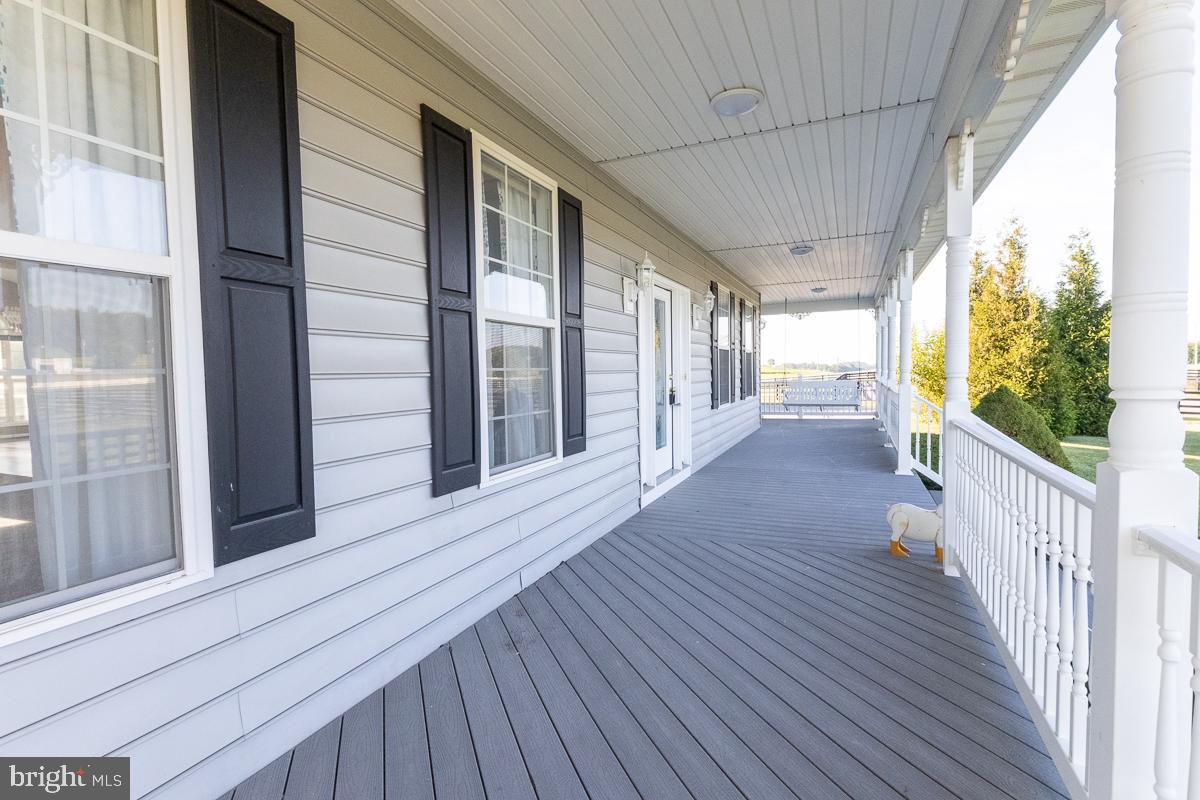 9630 Clemsonville Road Union Bridge, MD 21791 - Photo 68 of 70 a view of a house with porch and wooden floor