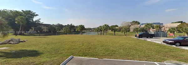 a view of outdoor space and yard