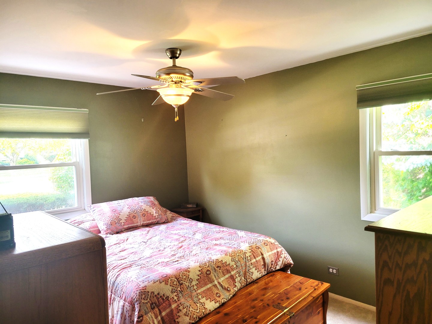 421 North Braintree Drive Schaumburg, IL 60169 - Photo 19 of 23 a bedroom with a bed and a window