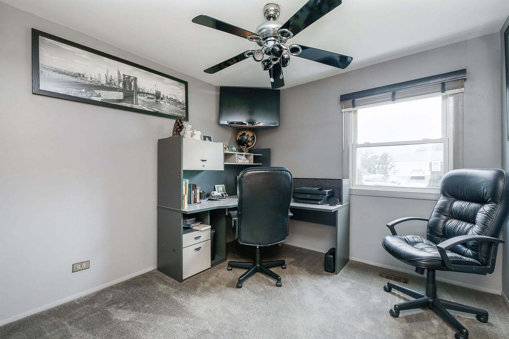 421 North Braintree Drive Schaumburg, IL 60169 - Photo 20 of 23 a view of a workspace with furniture and a window