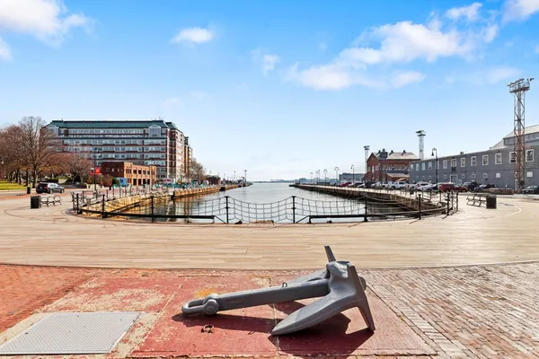 a terrace with outdoor seating and city view