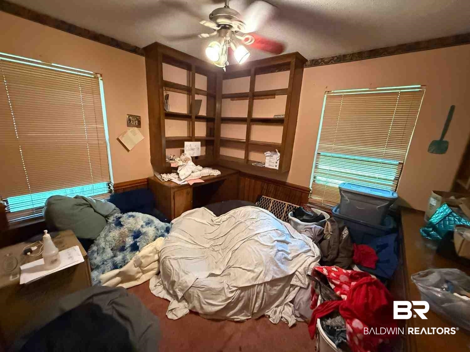 3721 Robertson Court Mobile, AL 36693 - Photo 17 of 22 Bedroom with a ceiling fan and a wainscoted wall