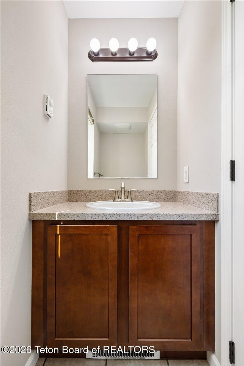 1872 Josephine Loop Jackson, WY 83001 - Photo 10 of 27 Half bath